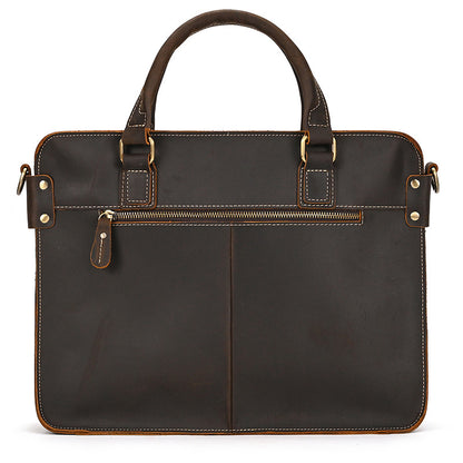 Back of the dark brown briefcase with a zip pocket across the top