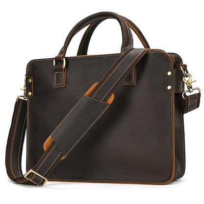 Dark brown briefcase, three-quarter view, with two top handles and a shoulder strap