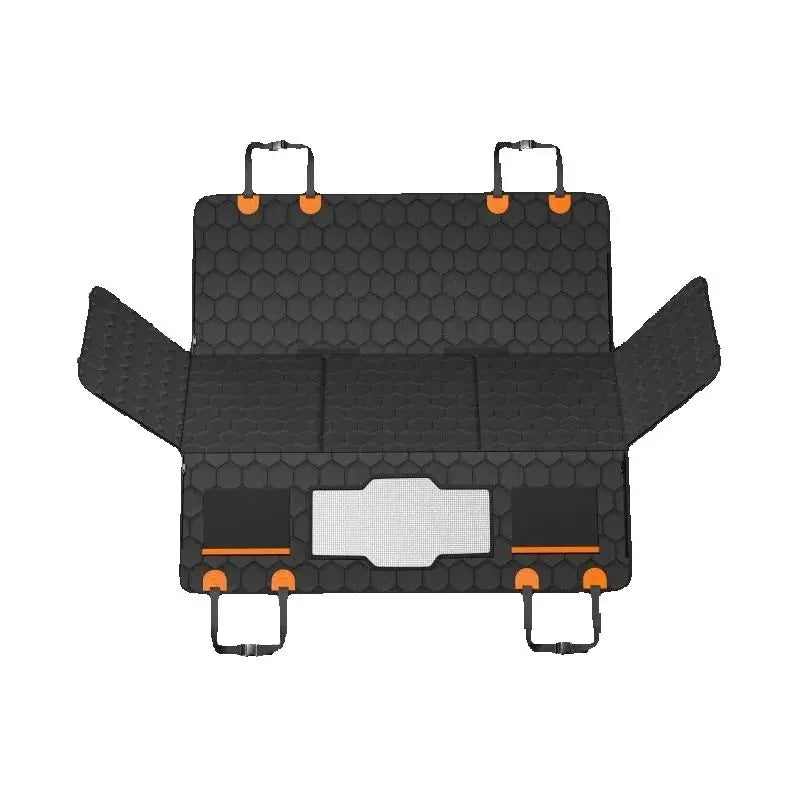 Black hex-quilted back seat extender shown flat with side flaps open, mesh window and orange buckle tabs